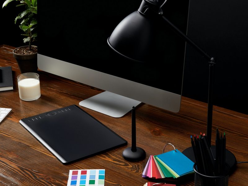 close-up-view-of-graphic-designer-workplace-with-colorful-pallet-graphic-tablet-blank-computer.jpg